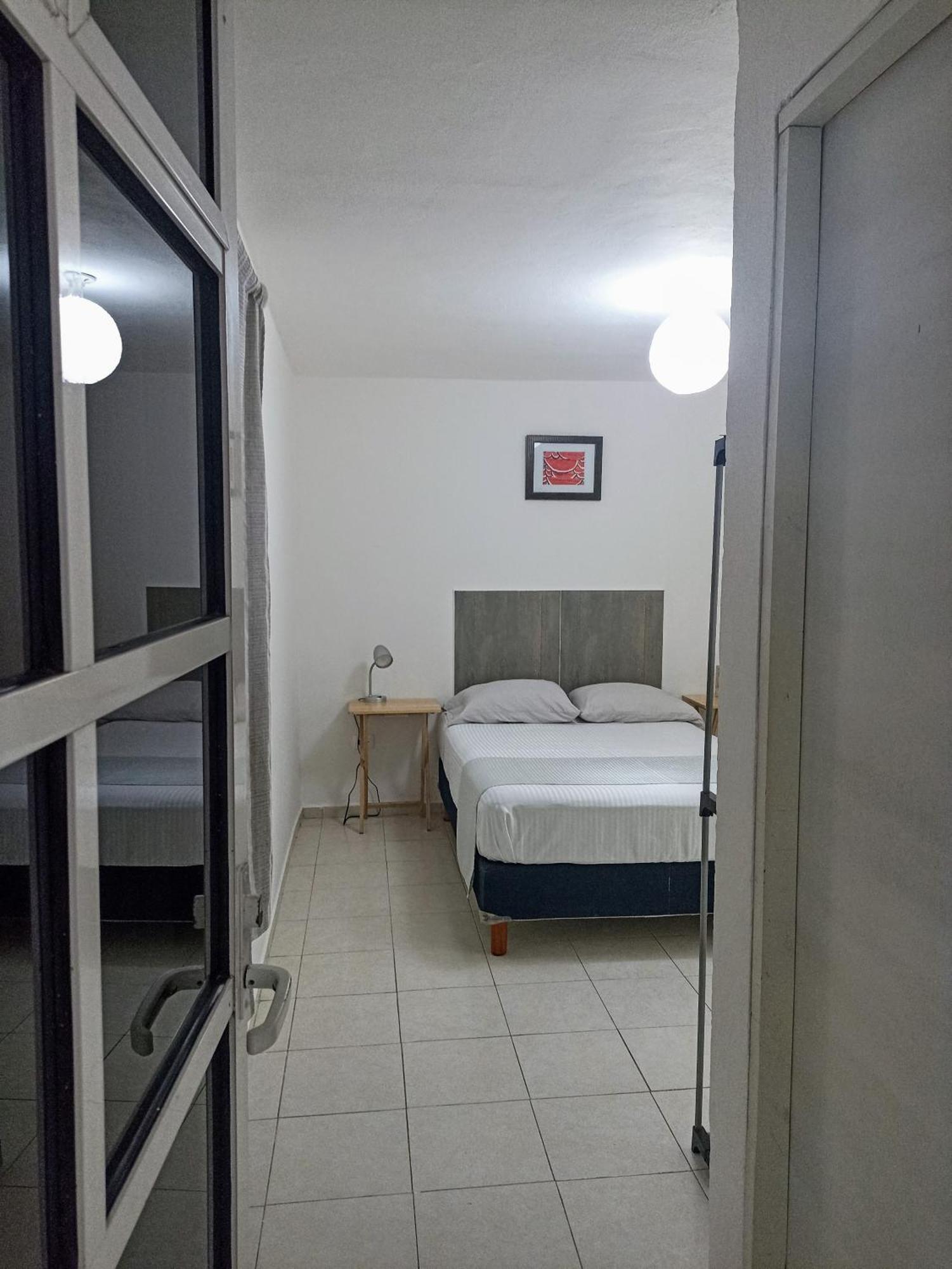 Tr3S By Walter De La Renta Apartman Cancún Szoba fotó
